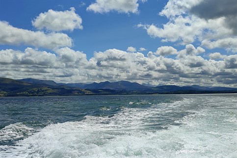 View of Eryri (Snowdonia) from one of Anglesey and Menai Strait boat trips